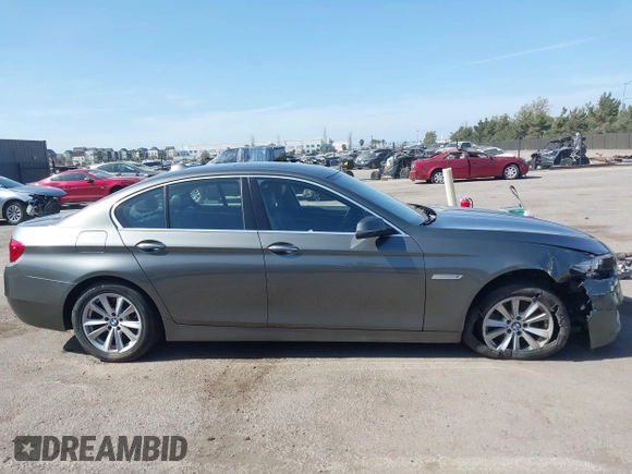 2015 BMW 5 Series 528i z VIN WBA5A5C5XFD515013, wystawiony jako IAAI lot #42105984 z przebiegiem 157 465 mil mil oraz . Historia ofert i sprzedaży dostępna na DreamBid. Obrazek 13.