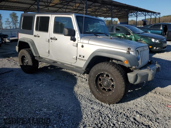 2009 Jeep Wrangler Unlimited X with VIN 1J4GA39179L756228, listed as a Copart auction lot 50086445 with 158,274 mi miles and Salvage Title. Bid and sale history available at carsss.com. Image 4.