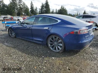 2016 Tesla Model S 90D with VIN 5YJSA1E24GF172713, listed as a Copart auction lot 50810655 with 61,156 mi miles and Salvage Title. Bid and sale history available at carsss.com. Image 2.