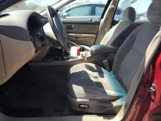 2002 Ford Taurus SES Standard z VIN 1FAFP55S02A219685, wystawiony jako Copart lot #52382425 z przebiegiem 91 800 mil mil oraz Nie do naprawy • Non repairable. Historia ofert i sprzedaży dostępna na DreamBid. Obrazek 7.
