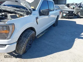 2023 Ford F-150 XL with VIN 1FTFW1E56PFC91467, listed as a IAAI auction lot 41030658 with 31,325 mi miles. Bid and sale history available at carsss.com. Image 6.