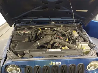 2009 Jeep Wrangler X with VIN 1J4FA24149L728979, listed as a IAAI auction lot 41905455 with 144,221 mi miles and . Bid and sale history available at DreamBid. Image 10.