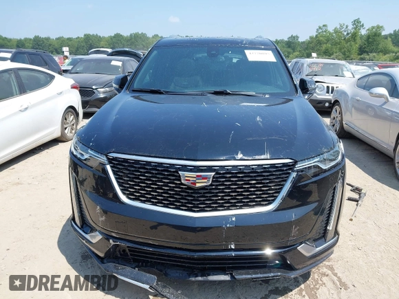 2021 Cadillac XT6 Premium Luxury with VIN 1GYKPDRS0MZ153523, listed as a IAAI auction lot 42770895 with 19,843 mi miles and . Bid and sale history available at DreamBid. Image 12.