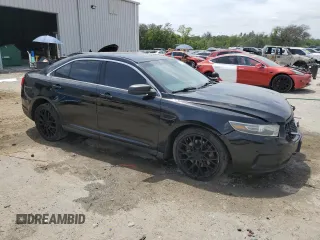 2014 Ford Police Interceptor with VIN 1FAHP2MT2EG161579, listed as a Copart auction lot 53878845 with 205,031 mi miles and Salvage title. Bid and sale history available at DreamBid. Image 4.