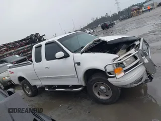 1999 Ford F-150 XL with VIN 1FTRX18L6XNB48352, listed as a IAAI auction lot 41717057 with 171,654 mi miles. Bid and sale history available at carsss.com. Image 14.