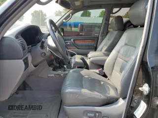 1998 Lexus LX 470 z VIN JT6HT00W0W0022045, wystawiony jako Copart lot #64022034 z przebiegiem 207 846 mil mil oraz Szkoda całkowita • Salvage title. Historia ofert i sprzedaży dostępna na DreamBid. Obrazek 7.