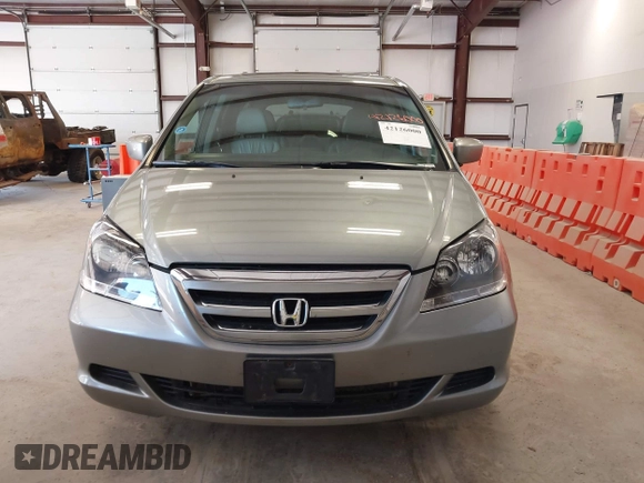 2007 Honda Odyssey EX-L with VIN 5FNRL38737B095747, listed as a IAAI auction lot 42126000 with 178,779 mi miles. Bid and sale history available at carsss.com. Image 12.