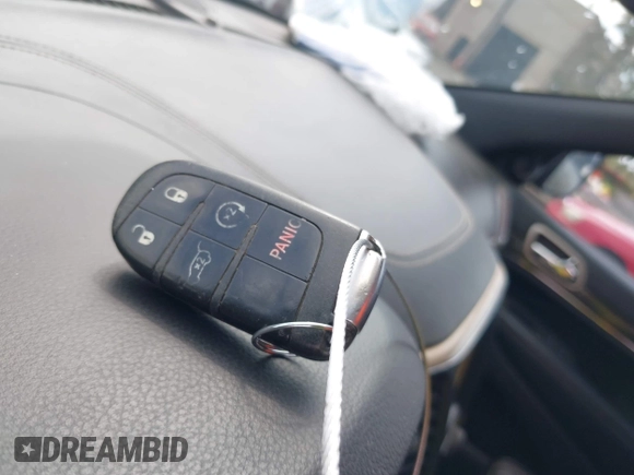 2014 Jeep Grand Cherokee Overland with VIN 1C4RJFCT8EC106005, listed as a IAAI auction lot 41989721 with 148,469 mi miles and . Bid and sale history available at DreamBid. Image 11.