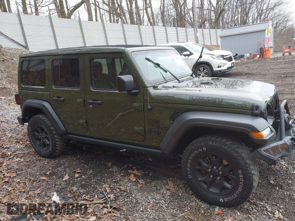 2021 Jeep Wrangler Unlimited Willys with VIN 1C4HJXDNXMW579595, listed as a IAAI auction lot 41930989 with 32,148 mi miles and . Bid and sale history available at DreamBid. Image 14.