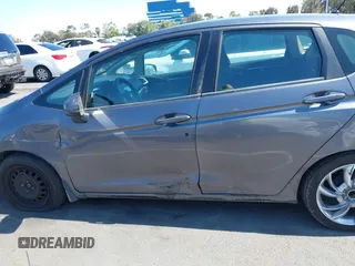 2015 Honda Fit LX with VIN 3HGGK5G54FM731965, listed as a IAAI auction lot 42655355 with 141,205 mi miles and . Bid and sale history available at DreamBid. Image 14.