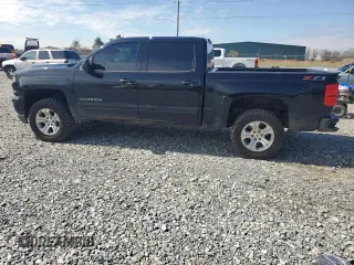 2018 Chevrolet Silverado 1500 LT with VIN 3GCUKREC3JG425552, listed as a Copart auction lot 46662535 with 122,469 mi miles and Salvage Title. Bid and sale history available at carsss.com. Image 2.
