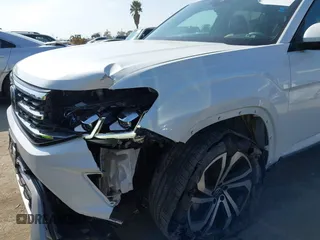 2023 Volkswagen Atlas SEL with VIN 1V2BR2CA7PC527099, listed as a IAAI auction lot 42099076 with 13,710 mi miles and . Bid and sale history available at DreamBid. Image 6.
