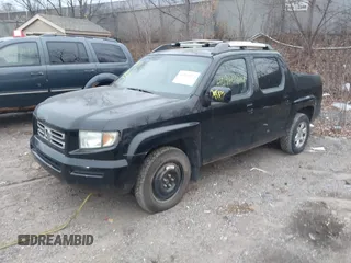 2007 Honda Ridgeline RTL z VIN 2HJYK16527H510681, wystawiony jako IAAI lot #40920924 z przebiegiem Nie podano mil oraz . Historia ofert i sprzedaży dostępna na DreamBid. Obrazek 17.