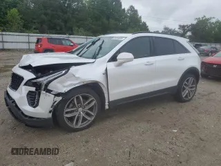2019 Cadillac XT4 FWD Sport с VIN 1GYFZER49KF199885, выставлен на аукционе Copart как лот 56836895 с пробегом 58 486 миль миль и Списание • Salvage title. История ставок и продаж доступна на DreamBid. Изображение 1.