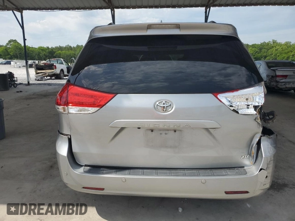 2012 Toyota Sienna XLE AAS с VIN 5TDYK3DC1CS240100, выставлен на аукционе Copart как лот 56975235 с пробегом 251 340 миль миль и Списание • Salvage title. История ставок и продаж доступна на DreamBid. Изображение 6.