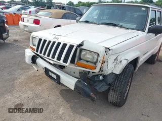 1998 Jeep Cherokee Sport z VIN 1J4FJ68S6WL124839, wystawiony jako IAAI lot #42421174 z przebiegiem 167 762 mil mil oraz . Historia ofert i sprzedaży dostępna na DreamBid. Obrazek 6.