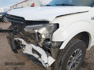 2019 Ford F-150 XL with VIN 1FTEW1E45KKE21872, listed as a IAAI auction lot 40704365 with 112,221 mi miles and . Bid and sale history available at DreamBid. Image 21.