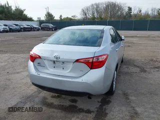 2019 Toyota Corolla L with VIN 5YFBURHE2KP934042, listed as a IAAI auction lot 41963491 with 87,299 mi miles. Bid and sale history available at carsss.com. Image 4.