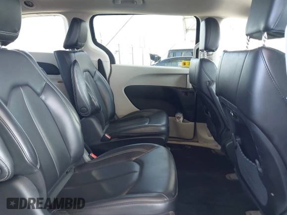 2023 Chrysler Pacifica Hybrid Touring L with VIN 2C4RC1L73PR509853, listed as a IAAI auction lot 41690872 with 83,014 mi miles and . Bid and sale history available at DreamBid. Image 8.