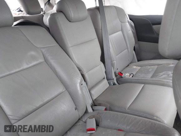 2012 Honda Odyssey Touring with VIN 5FNRL5H99CB028304, listed as a IAAI auction lot 42031916 with 216,185 mi miles and . Bid and sale history available at DreamBid. Image 8.
