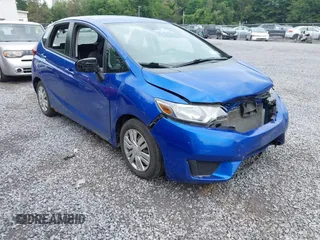 2015 Honda Fit LX with VIN 3HGGK5G59FM711808, listed as a IAAI auction lot 42655848 with 169,780 mi miles and . Bid and sale history available at DreamBid. Image 1.