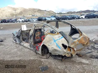 2018 Tesla Model 3 Long Range Battery with VIN 5YJ3E1EB5JF100466, listed as a IAAI auction lot 41413723 with Not Provided miles and . Bid and sale history available at DreamBid. Image 3.