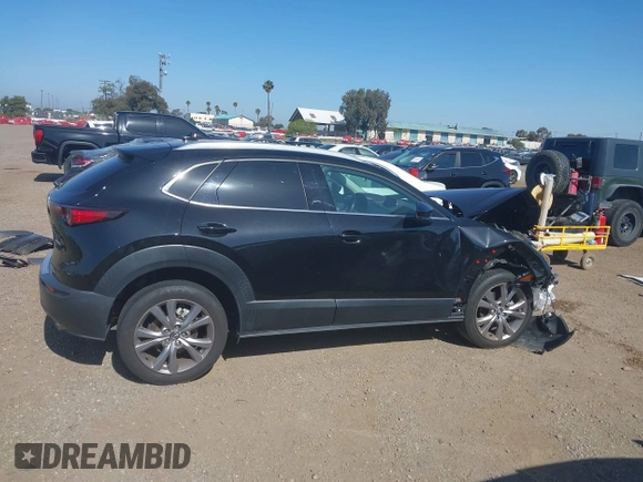 2022 Mazda CX-30 S Premium with VIN 3MVDMBDL6NM407913, listed as a IAAI auction lot 42359860 with 35,804 mi miles and . Bid and sale history available at DreamBid. Image 14.