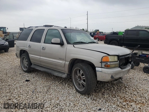 2004 GMC Yukon SLT with VIN 1GKEC13Z34R313210, listed as a Copart auction lot 51150575 with 328,961 mi miles and Salvage Title. Bid and sale history available at carsss.com. Image 4.