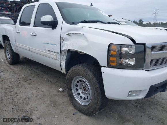 2009 Chevrolet Silverado 1500 LTZ with VIN 3GCEK33MX9G111454, listed as a IAAI auction lot 41148492 with 303,878 mi miles. Bid and sale history available at carsss.com. Image 6.