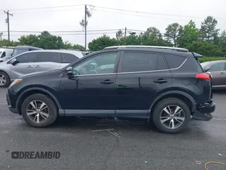 2018 Toyota RAV4 XLE with VIN 2T3WFREVXJW501296, listed as a IAAI auction lot 42358130 with 163,669 mi miles and . Bid and sale history available at DreamBid. Image 15.