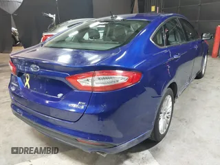 2016 Ford Fusion SE Hybrid with VIN 3FA6P0LU0GR242288, listed as a IAAI auction lot 41867085 with 114,063 mi miles. Bid and sale history available at carsss.com. Image 4.