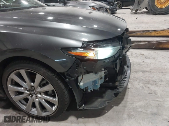 2020 Mazda 3 Premium with VIN 3MZBPBEM3LM123091, listed as a IAAI auction lot 41568213 with 68,515 mi miles and . Bid and sale history available at DreamBid. Image 18.