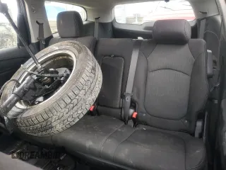 2016 Chevrolet Traverse LT with VIN 1GNKRGKD2GJ148251, listed as a Copart auction lot 56477355 with 130,931 mi miles and Salvage title. Bid and sale history available at DreamBid. Image 10.