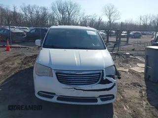 2013 Chrysler Town & Country Touring with VIN 2C4RC1BG8DR573559, listed as a IAAI auction lot 41793874 with 205,005 mi miles. Bid and sale history available at carsss.com. Image 13.