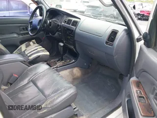 1998 Toyota 4Runner SR5 z VIN JT3GN86R5W0060650, wystawiony jako IAAI lot #42373192 z przebiegiem 264 886 mil mil oraz . Historia ofert i sprzedaży dostępna na DreamBid. Obrazek 5.