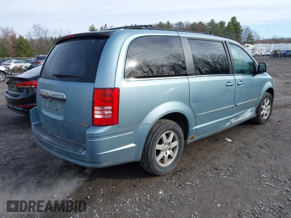 2010 Chrysler Town & Country Touring with VIN 2A4RR5D15AR415362, listed as a IAAI auction lot 41989057 with 133,406 mi miles and . Bid and sale history available at DreamBid. Image 4.
