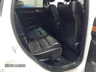 2013 Jeep Grand Cherokee Overland with VIN 1C4RJFCT1DC586886, listed as a IAAI auction lot 41941590 with 125,126 mi miles. Bid and sale history available at carsss.com. Image 8.