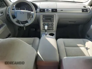 2005 Ford Five Hundred SE with VIN 1FAFP23115G159622, listed as a Copart auction lot 70700344 with 159,788 mi miles and Salvage Title. Bid and sale history available at carsss.com. Image 8.