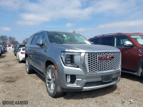 2023 GMC Yukon Denali with VIN 1GKS2DKL6PR231948, listed as a IAAI auction lot 41586428 with 69,458 mi miles. Bid and sale history available at carsss.com. Image 1.