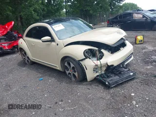 2019 Volkswagen Beetle S with VIN 3VWFD7AT2KM700941, listed as a IAAI auction lot 42474867 with 43,891 mi miles and . Bid and sale history available at DreamBid. Image 1.