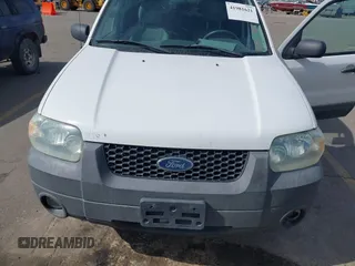 2006 Ford Escape Hybrid with VIN 1FMYU96H96KD56271, listed as a IAAI auction lot 41981621 with 156,825 mi miles and . Bid and sale history available at DreamBid. Image 6.