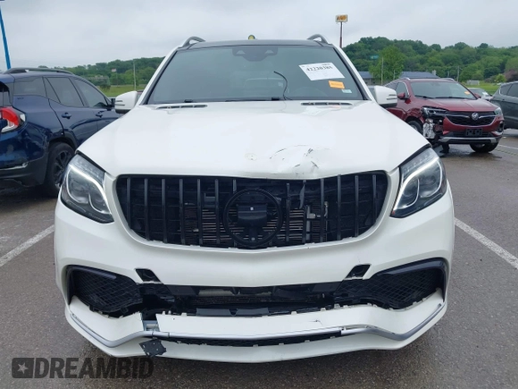 2018 Mercedes-Benz GLS 63 AMG with VIN 4JGDF7FE1JB099084, listed as a IAAI auction lot 42220385 with 97,904 mi miles and . Bid and sale history available at DreamBid. Image 12.