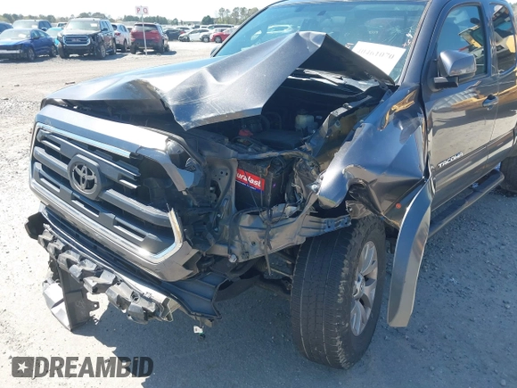 2016 Toyota Tacoma SR with VIN 5TFRX5GN6GX070766, listed as a IAAI auction lot 40461070 with 144,039 mi miles and . Bid and sale history available at DreamBid. Image 6.