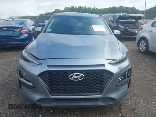 2019 Hyundai Kona SE with VIN KM8K12AAXKU298329, listed as a IAAI auction lot 42297990 with 57,176 mi miles and . Bid and sale history available at DreamBid. Image 12.