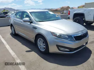 2013 Kia Optima LX with VIN KNAGM4A74D5423255, listed as a IAAI auction lot 42065230 with 116,589 mi miles. Bid and sale history available at carsss.com. Image 1.