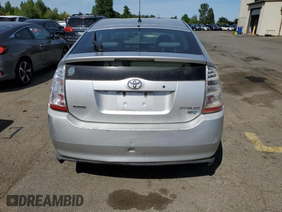 2007 Toyota Prius with VIN JTDKB20U177656906, listed as a Copart auction lot 55963525 with 142,515 mi miles and Clean Title. Bid and sale history available at DreamBid. Image 6.