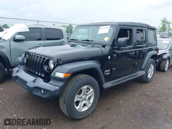 2018 Jeep Wrangler Unlimited Sport S with VIN 1C4HJXDG3JW150232, listed as a IAAI auction lot 42379385 with 60,679 mi miles and . Bid and sale history available at DreamBid. Image 2.
