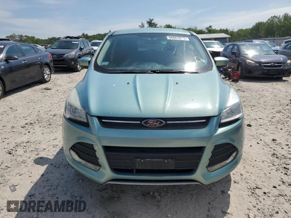 2013 Ford Escape SE z VIN 1FMCU9GX8DUC50864, wystawiony jako Copart lot #66066015 z przebiegiem 80 102 mil mil oraz Czysty tytuł • Clean title. Historia ofert i sprzedaży dostępna na DreamBid. Obrazek 5.