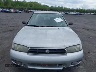 1998 Subaru Legacy L z VIN 4S3BK4353W7300794, wystawiony jako IAAI lot #42205793 z przebiegiem 227 539 mil mil oraz . Historia ofert i sprzedaży dostępna na DreamBid. Obrazek 6.