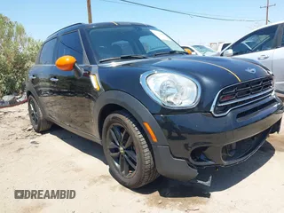 2015 MINI Countryman S with VIN WMWZC3C5XFWT02566, listed as a IAAI auction lot 42408045 with 114,822 mi miles and . Bid and sale history available at DreamBid. Image 6.